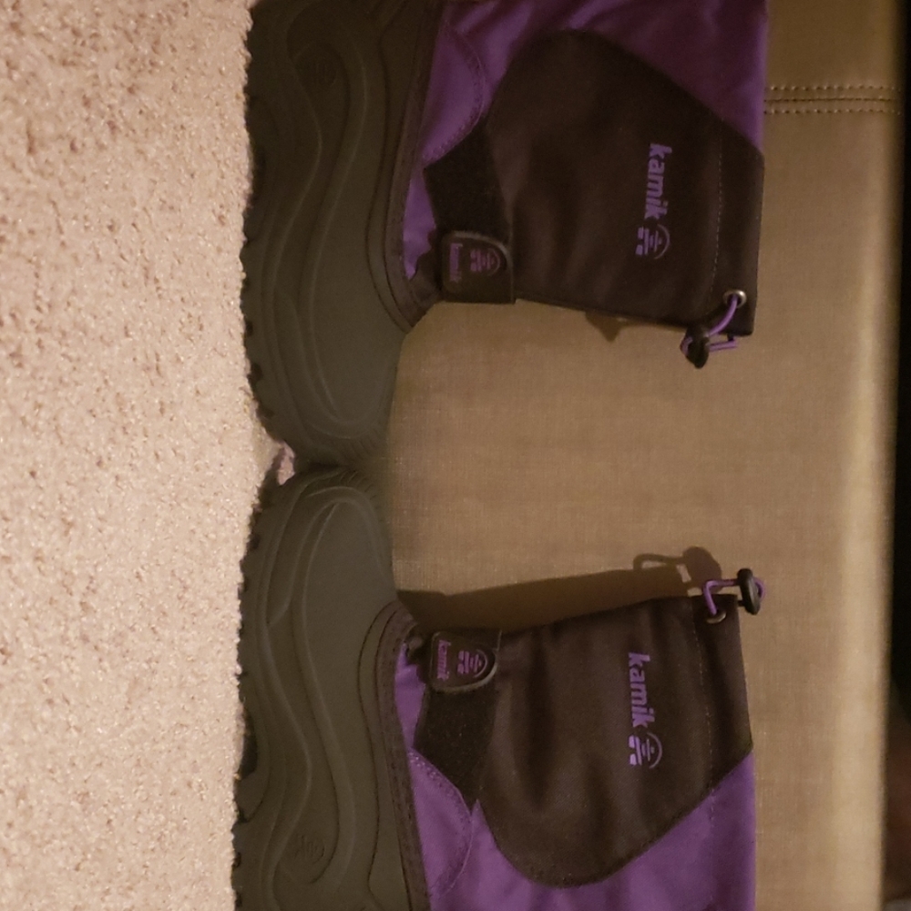Purple and black snow boots.